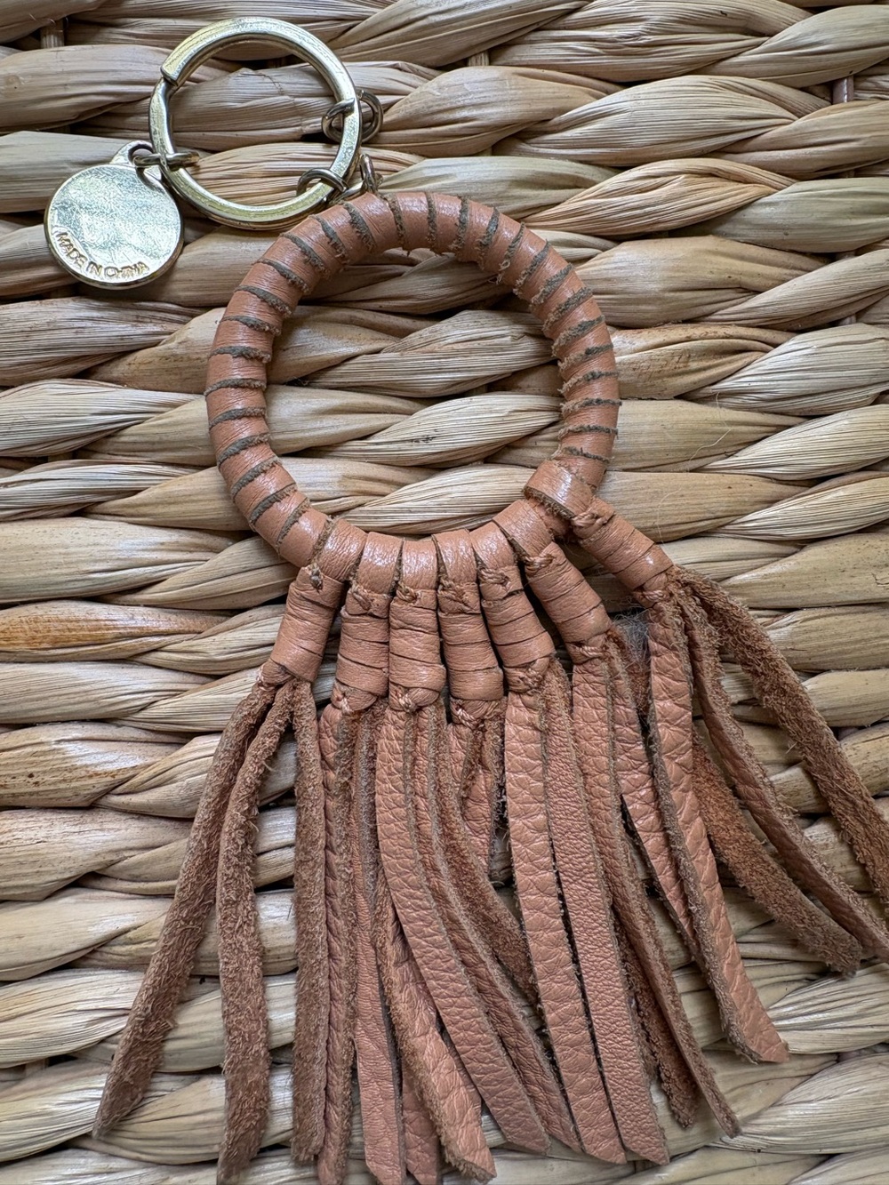 Rebecca Minkoff Leather Boho tassel purse charm.